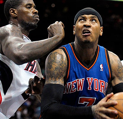 Melo battles through defenders to finish with 39 points and 10 rebounds as the Knicks escape Atlanta with a W. (AP)
