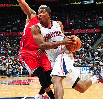 Joe Johnson keeps the home-court advantage dreams alive for the Hawks with a team-high 28 points against the Clippers. (Getty Images)