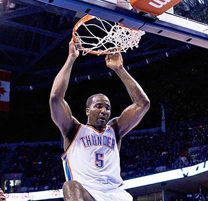 Kendrick Perkins follows through on a slam dunk for two of his 10 points to help the Thunder slip by the Kings. (US Presswire)