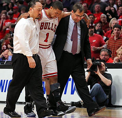 Rose comes up lame late in Game 1 after tallying a near triple double in 38 minutes as the Bulls cruise past Philly. (US Presswire)
