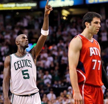 Kevin Garnett scores 20 points and collects 13 rebounds, helping the Celtics gain control of the series.  (US Presswire)
