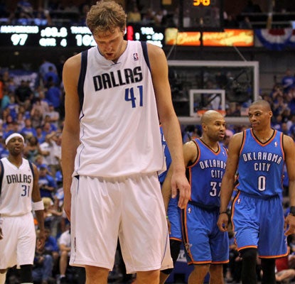 Dirk Nowitzki and the Mavericks are the first defending champs to get swept since the Heat in 2007.  (US Presswire)