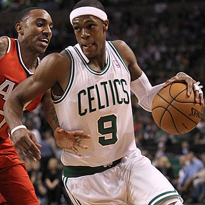 Rajon Rondo shoots 8 for 11 from the floor to score 20 points and tallies 16 assists in the Celtics' rout of the Hawks.  (Getty Images)