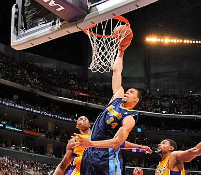 The Nuggets' JaVale McGee goes up for a dunk, scoring two of his 21 points against the Lakers in Game 5. (Getty Images)