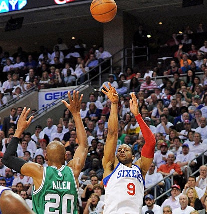 Andre Iguodala knocks down a 3-pointer over Ray Allen and goes 3-for-3 from downtown. (Getty Images)