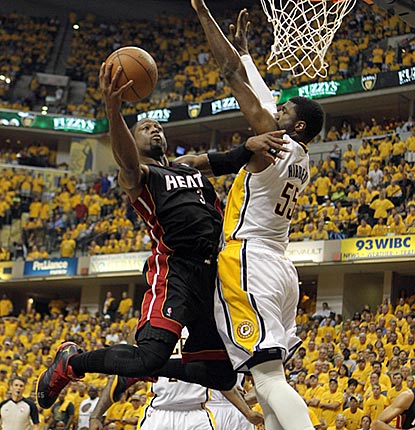 Dwyane Wade takes it to Roy Hibbert in the first half. Wade scores 20 of his 41 points in the second quarter.  (US Presswire)