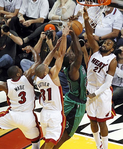 The Heat stifle the Celtics with a swarming defense that helps keep Boston below 40 percent shooting from the field. (AP)