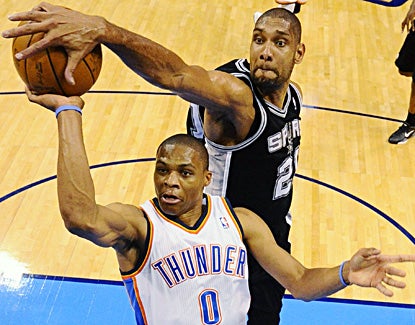 Despite becoming the all-time leading blocker in the postseason, Tim Duncan (11 points) and the Spurs will have to regroup. (AP)