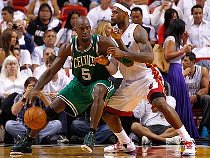 LeBron James (30 points) outscores Kevin Garnett, but the Celtics veteran proves better in crunch time.  (Getty Images)