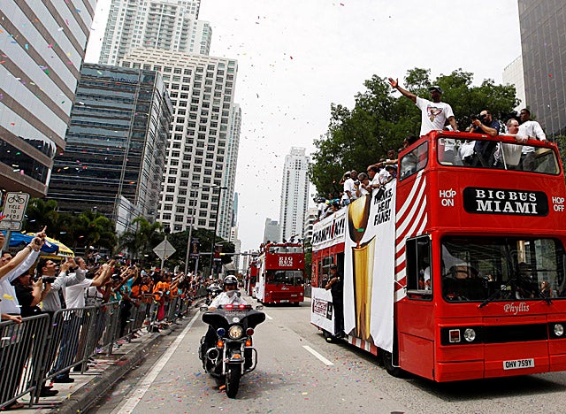Dwyane Wade leads the Heat's championship parade through downtown Miami. (AP)