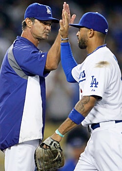 Mattingly and the Dodgers are all smiles now, but it wasn't like that last season. (Getty Images)