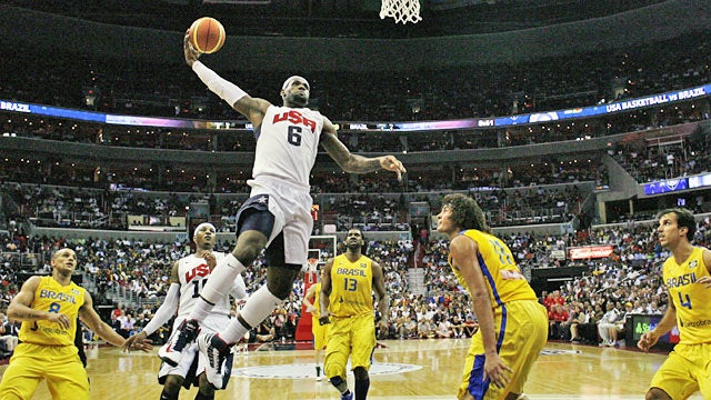 A size advantage can't help Brazil prevent LeBron from going airborne for 2 of his 30 points. (AP)