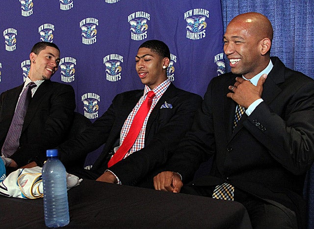 Williams, here with Anthony Davis and Austin Rivers, heads into his third season coaching the Hornets. (US Presswire)