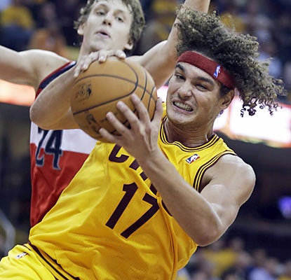 Anderson Varejao starts off the season in dominant fashion with a career-high 23 rebounds, nine points and nine assists. (AP)
