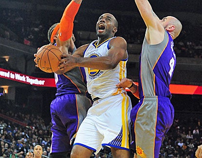 Carl Landry takes over in the 4th quarter for the Warriors against the Phoenix Suns. (US Presswire)