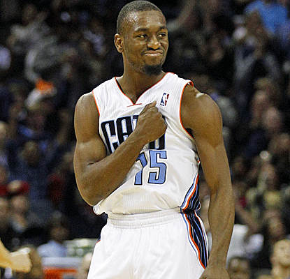 Kemba Walker scores a career-high 30 points as the Bobcats end their long run of futility.  (AP)
