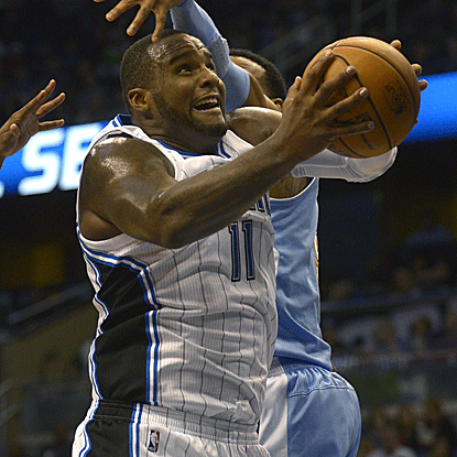 Glen Davis scores 29 points and posts 10 rebounds to power the Magic past the Nuggets. (AP)