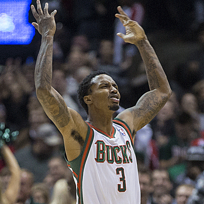 Brandon Jennings' game-winning 3 for the Bucks stands after refs confirm via replay that the shot got off before the buzzer.  (AP)