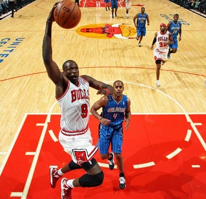 Luol Deng scores 15 of his 23 points in the second half to help the Bulls edge the Magic in Chicago.  (US Presswire)