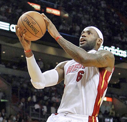LeBron James (20-8-12) finishes two assists shy of a triple-double as Miami surpasses 100 points for the fifth straight game. (AP)
