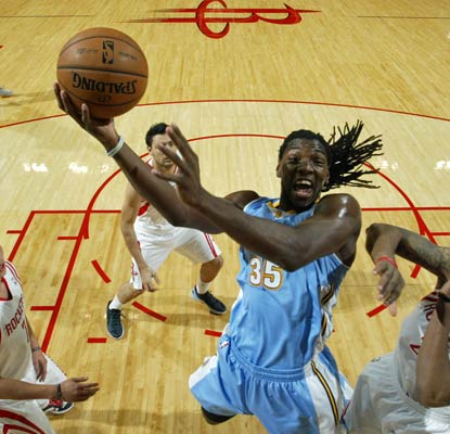 Kenneth Faried is relentless against the Rockets with 16 points and 16 rebounds for the Nuggets.   (Getty Images)