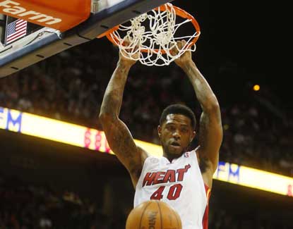 Miami's Udonis Haslem throws down a dunk in the Heat's 95-89 win over Atlanta. (US Presswire)