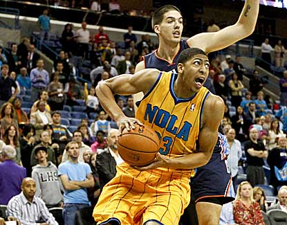 New Orleans forward Anthony Davis scores 23 points and 11 boards in the Hornets' 107-99 win. (US Presswire)