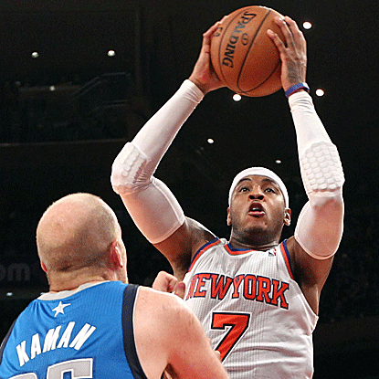 Carmelo Anthony scores 31 points as the Knicks beat the Mavs and improve to 4-0 for the first time since 1993-94. (US Presswire)
