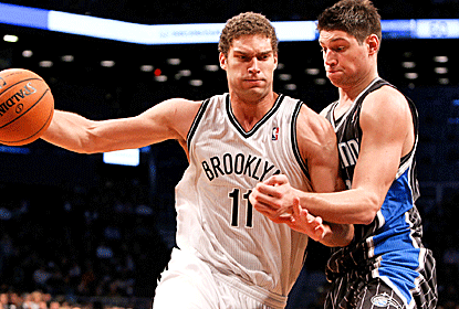 Brooke Lopez posts 20 points and Kris Humphries grabs 21 boards as the Nets finish a home-and-home sweep of the Magic.  (US Presswire)