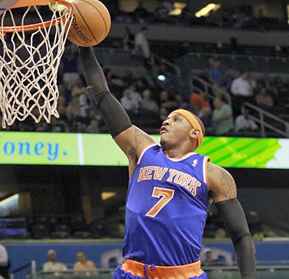 Melo scores a game-high 25 points and pulls down eight boards as the Knicks remain unbeaten. (AP)