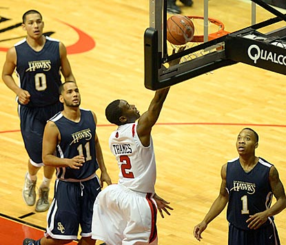 Hawks defenders can only watch as Aztecs guard Xavier Thames scores on a layup in the second half.  (US Presswire)