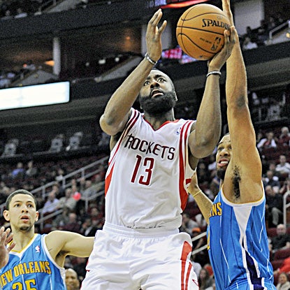 James Harden goes up for two of his 30 points in the Rockets' four-point win over the Hornets. (AP)