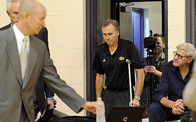 New Lakers coach Mike D'Antoni is on crutches while recovering from surgery. (US Presswire)