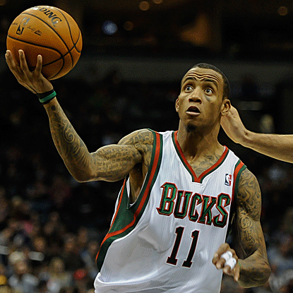 Monta Ellis scores six of his 22 points in the game's final two minutes to carry the Bucks over the Hornets. (US Presswire)
