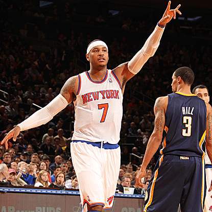 Carmelo Anthony scores a game-high 26 points to lift the Knick to their seventh win in their season's first eight games. (Getty Images)