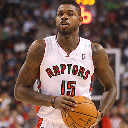 Amir Johnson scores 14 of his 15 points in the fourth quarter to help the Raptors get past the struggling Magic. (US Presswire)