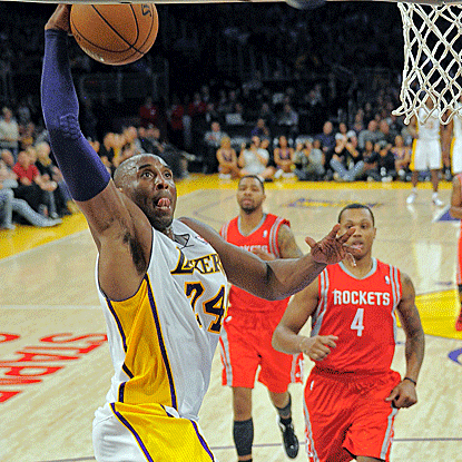 Kobe Bryant records his 18th career triple-double in the Lakers' victory over the Rockets. (AP)