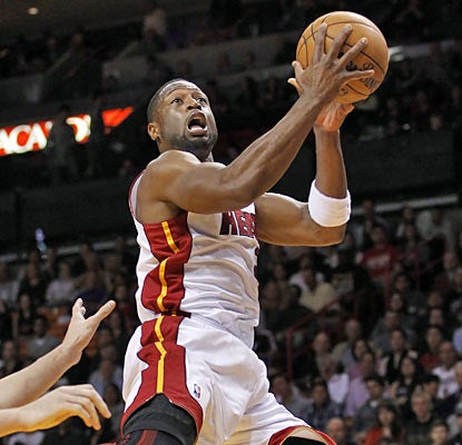 Dwyane Wade ties a game-high with 28 points on 11 of 21 shooting from the field as the Heat drop the Bucks. (AP)