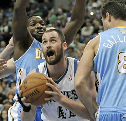 Kevin Love, who makes his season debut earlier than expected, puts up 34 points and 14 boards in a losing effort. (AP)