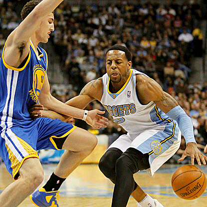 Andre Iguodala scores 21 points in the second half to help lead the Nuggets past the Warriors. (US Presswire)