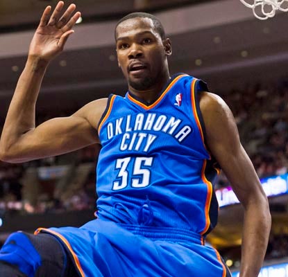 Kevin Durant does his thing, dropping 37 points on the 76ers, including the Thunder's first five in OT.  (US Presswire)