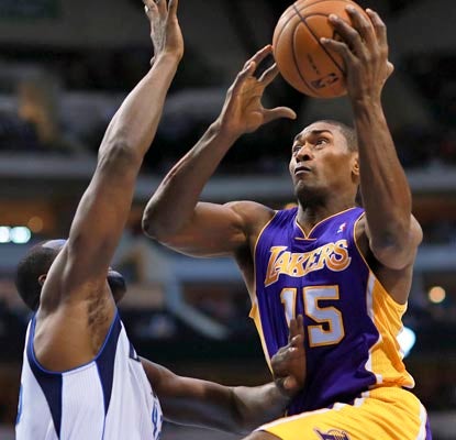 The Lakers' first road win of the season is a total team effort, and Metta World Peace chips in with 19 points.  (AP)