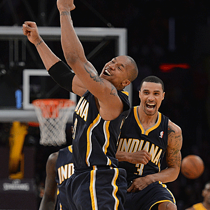 George Hill's driving layup with 0.1 seconds remaining breaks a tie game and puts the Pacers past the Lakers. (Getty Images)
