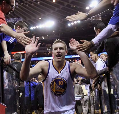 David Lee and the Warriors get more than a few scares but come up with the victory over the Nuggets.  (Getty Images)