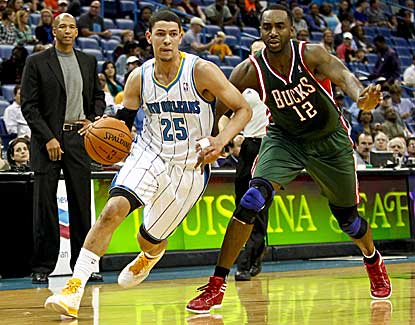Hornets guard Austin Rivers drives past Milwaukee's Luc Richard Mbah a Moute on Monday. (US Presswire)