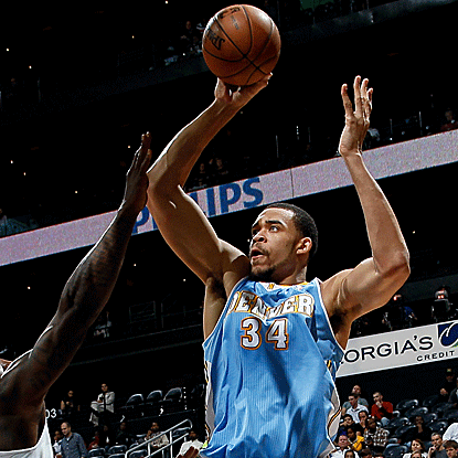 JaVale McGee comes off the bench to score 20 points and grab eight rebounds in the Nuggets' victory. (Getty Images)