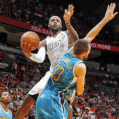 LeBron James has scored at least 20 points in all 18 Heat games this season, including 24 in their win over the Hornets.  (US Presswire)