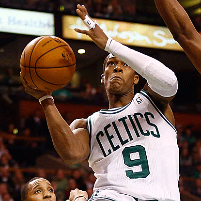 The Celtics' Rajon Rondo collects 11 assists and grabs nine boards but falls three points shy of earning another triple-double. (Getty Images)