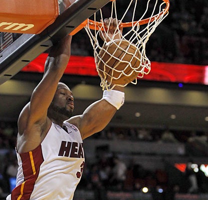 Dwyane Wade puts up 26 points on 11-of-13 shooting and also adds four rebounds and three assists in the win. (AP)
