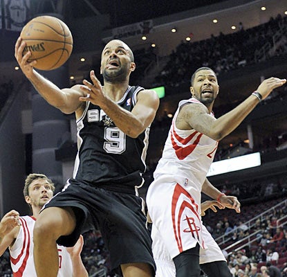 Tony Parker comes through with his first career triple-double as he finishes with 29 points, 12 assists and 12 rebounds. (AP)